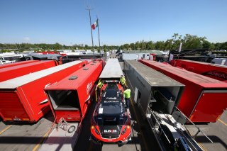 CARS IN PADDOCK