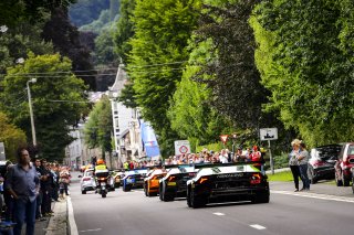 CARS ON THE WAY TO THE PARADE