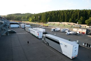 TRUCKS IN PADDOCK
