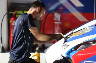 MECHANIC WORKING ON A CAR