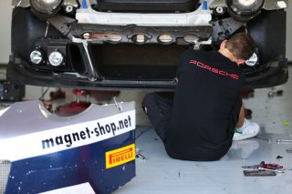 MECHANIC WORKING ON A CAR