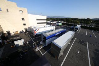 TRUCKS IN PADDOCK