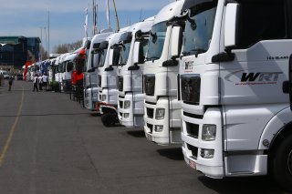 TRUCKS IN THE PADDOCK