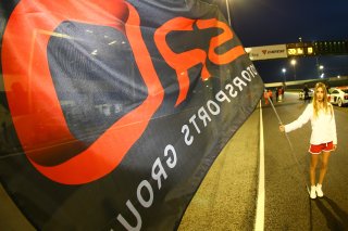 GRID GIRL WITH A SRO FLAG