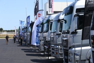 TRUCKS IN THE PADDOCK
