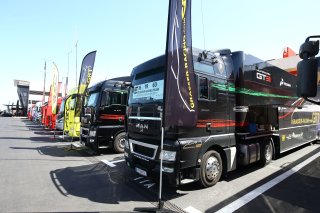 TRUCKS IN THE PADDOCK