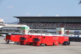 TRUCKS IN THE PADDOCK