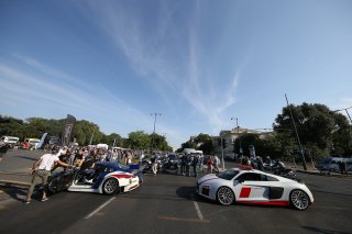 CARS ON THE WAY TO THE PARADE