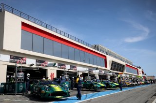 Cars in the pit lane at the start of pre qualifying
