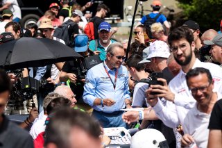 Jacky Ickx signs autographs for fans
