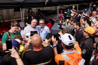 Jacky Ickx signs autographs for fans