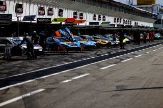 Cars in the pit lane at the start of pre qualifying