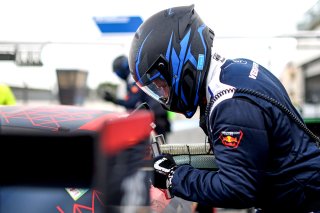 Mechanics in the pit lane