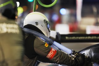 Mechanics in the pit lane