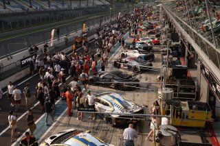 Fans in the pitlane after the race
