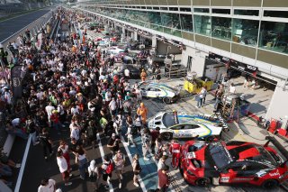 Fans in the pitlane after the race