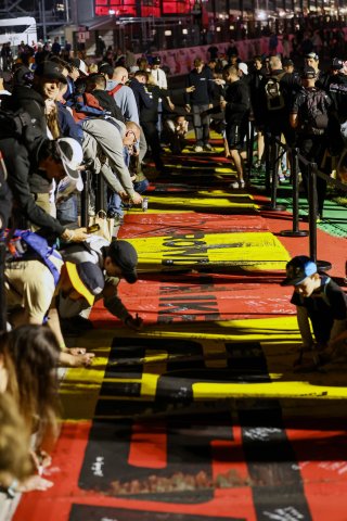 Fans track walk and track signing