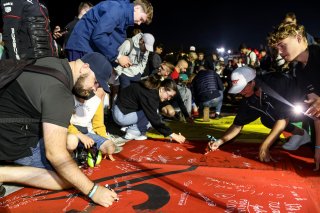 Fans track walk and track signing