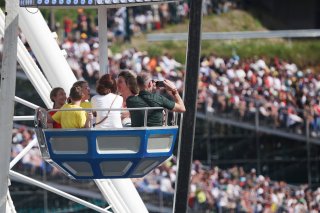 Fans watching the race from the Ferris Wheel