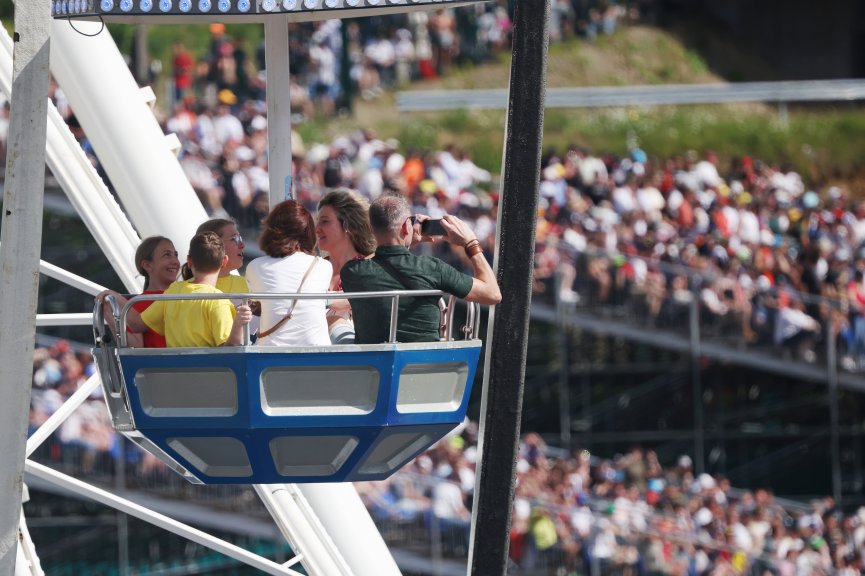 Fans watching the race from the Ferris Wheel