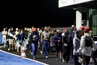 Fans pit walk by night