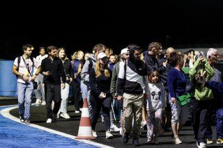 Fans pit walk by night
