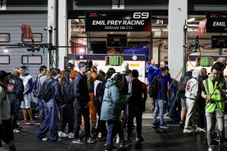 Fans pit walk by night