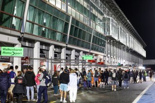 Fans pit walk by night
