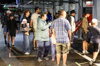 Fans pit walk by night