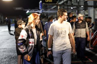 Fans pit walk by night