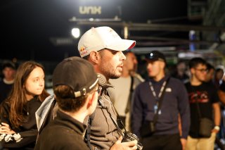 Fans pit walk by night
