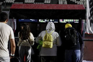 Fans pit walk by night