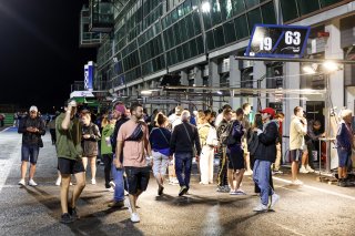 Fans pit walk by night