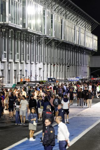 Fans pit walk by night
