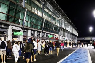 Fans pit walk by night