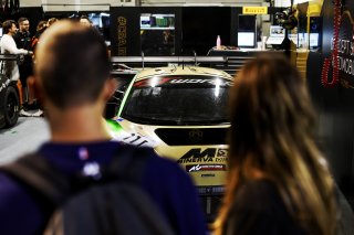 Fans pit walk by night