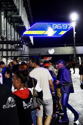 Fans pit walk by night