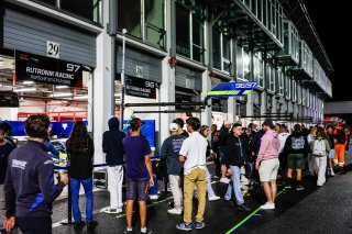 Fans pit walk by night