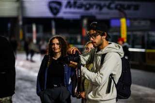 Fans pit walk by night