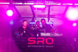 A DJ in the paddock