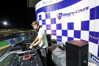 A DJ on the podium