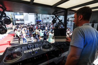 A DJ in the paddock