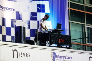 A DJ on the podium