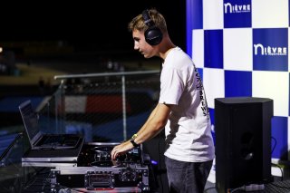 A DJ on the podium