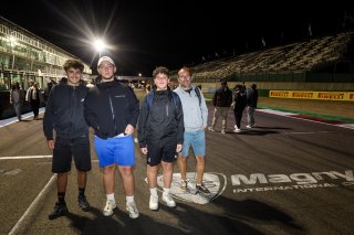 Fans walk the track