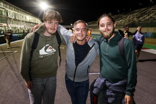 Fans walk the track