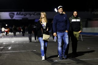 Fans walk the track