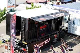 A DJ in the paddock