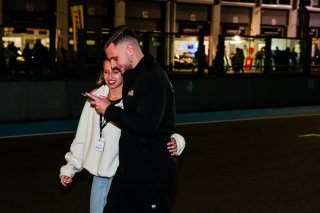 Fans walk the track