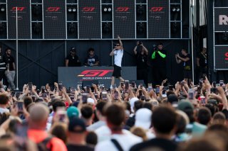 Kidd Keo plays a concert in the paddock